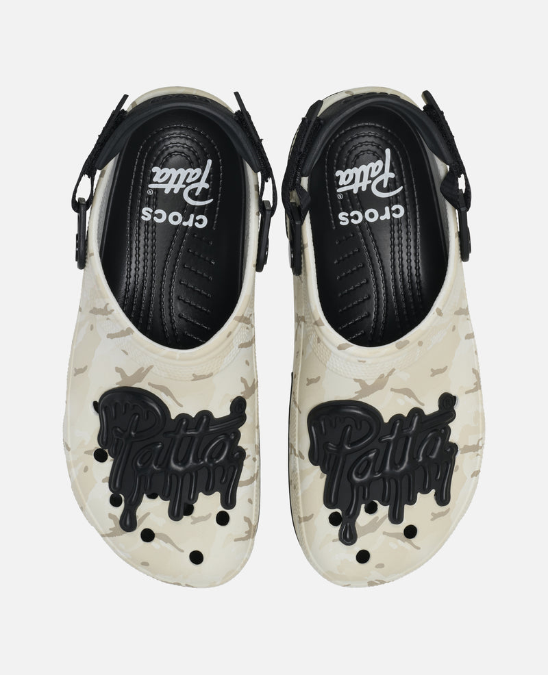 Patta x Crocs Classic EXP Clog White top view showing Patta Jibbitz charms including brick wall detail