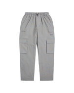 Reflective Patta cargo pants with digital camouflage pattern and Patta logo