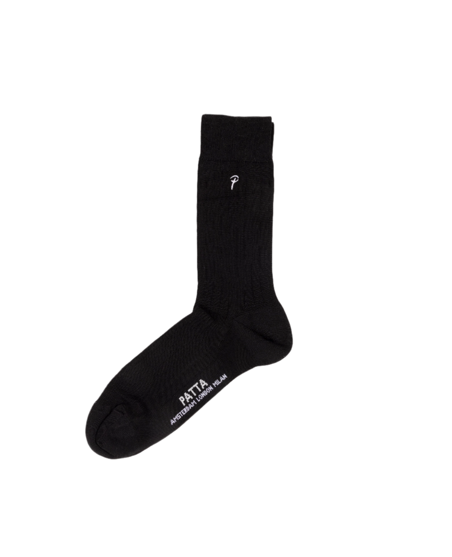 Black Patta basic dress socks with a subtle Patta 'P' script logo